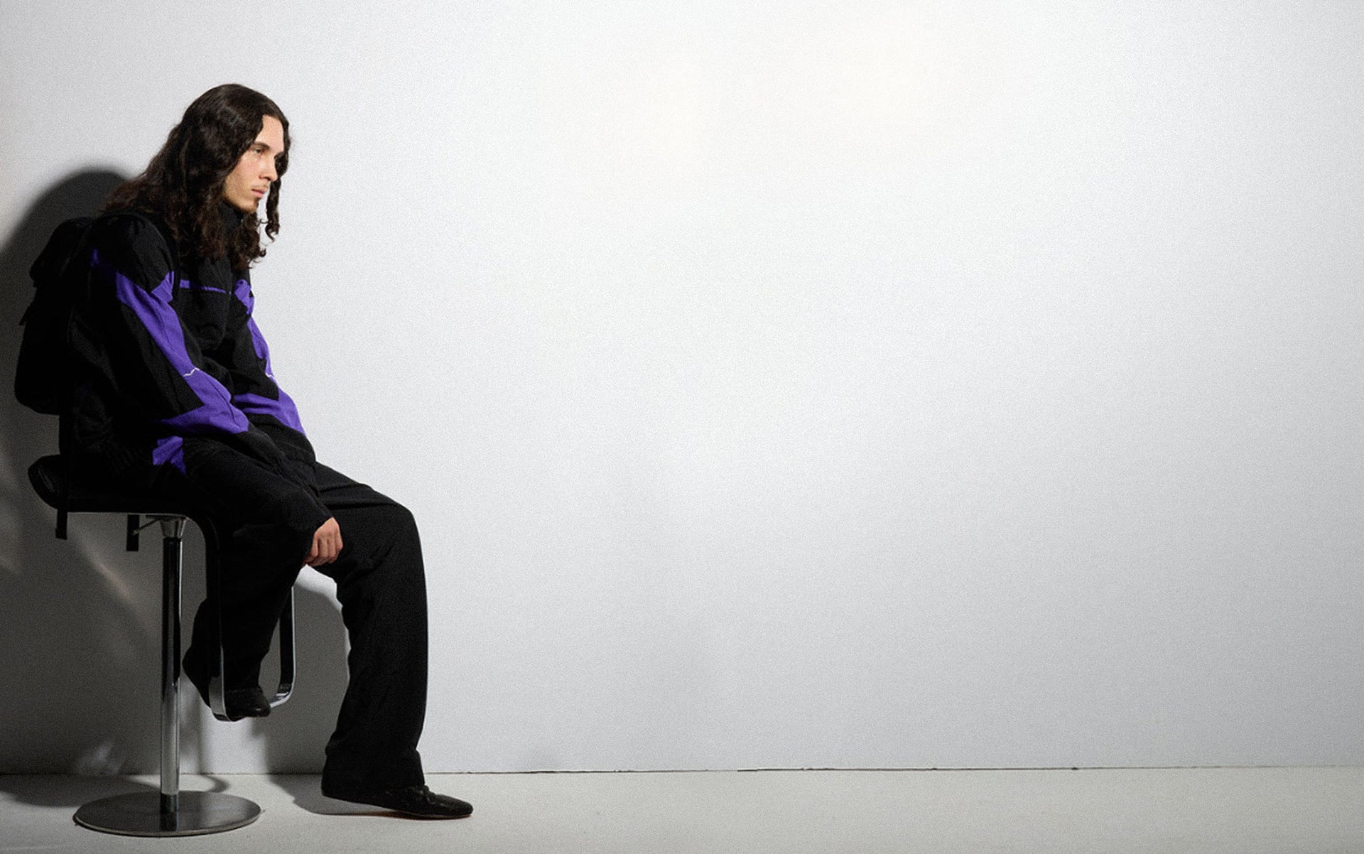 VIVET campaign — black and violet tracksuit